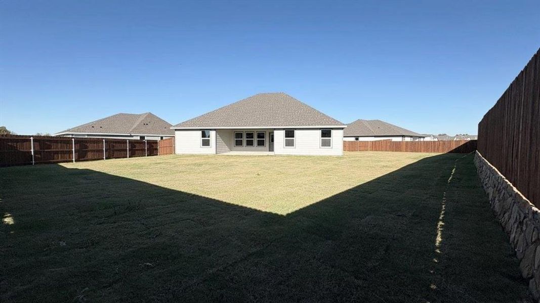 Exterior details and patio area of a home in Sandstone Estates, Granbury (Image 15). Exterior details and patio area of a home in Sandstone Estates, Granbury (Image 15).