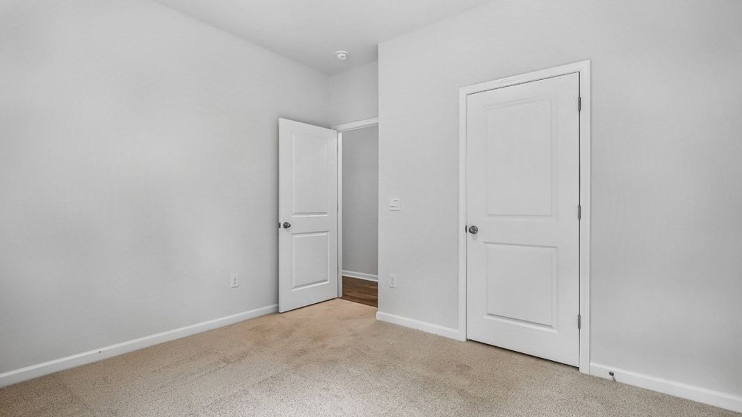 Spacious, unfurnished interior of a new home in The Landing at Summerhaven, Mebane (Image 16).