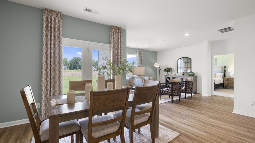 Representative furnished interior of a home built from the Cali by D.R. Horton in Champion's Run, Lithonia (Image 6).