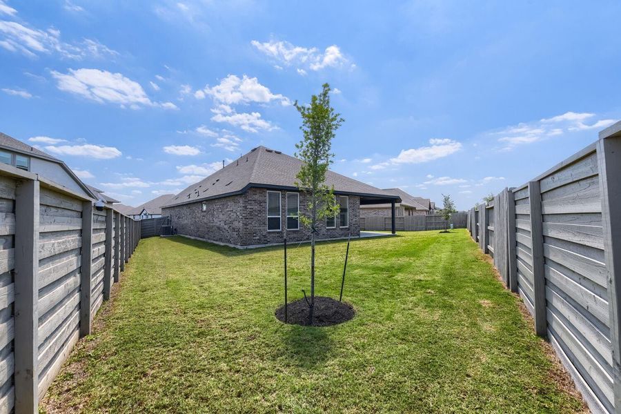 Oversized lot with options for separate play spaces and sprinkler system