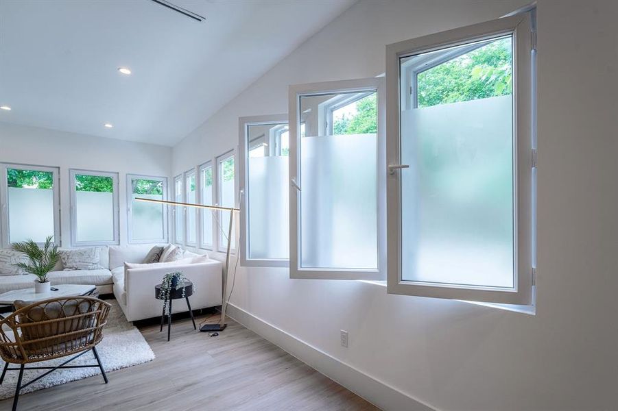 Sunroom / solarium featuring vaulted ceiling Sunroom / solarium featuring vaulted ceiling
