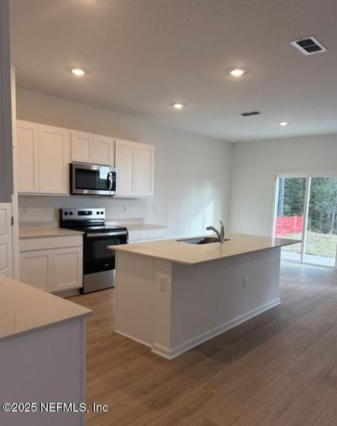 Furnished interior view inside a new home in Copes Landing, Jacksonville (Image 6). Furnished interior view inside a new home in Copes Landing, Jacksonville (Image 6).