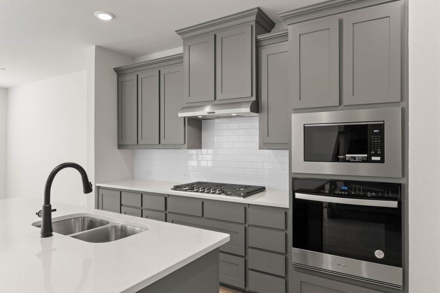 Representative exterior photo of a completed home built from the Whitney by Impression Homes in Timber Ridge, Corinth, TX (Image 11).