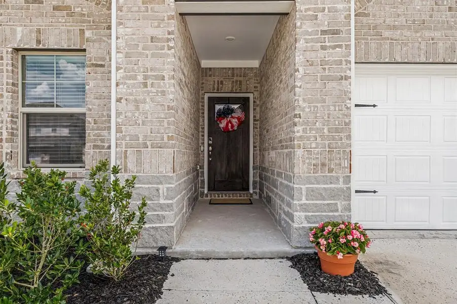 Exterior details and patio area of a home in Lakehaven - Signature Series, Farmersville (Image 3). Exterior details and patio area of a home in Lakehaven - Signature Series, Farmersville (Image 3).