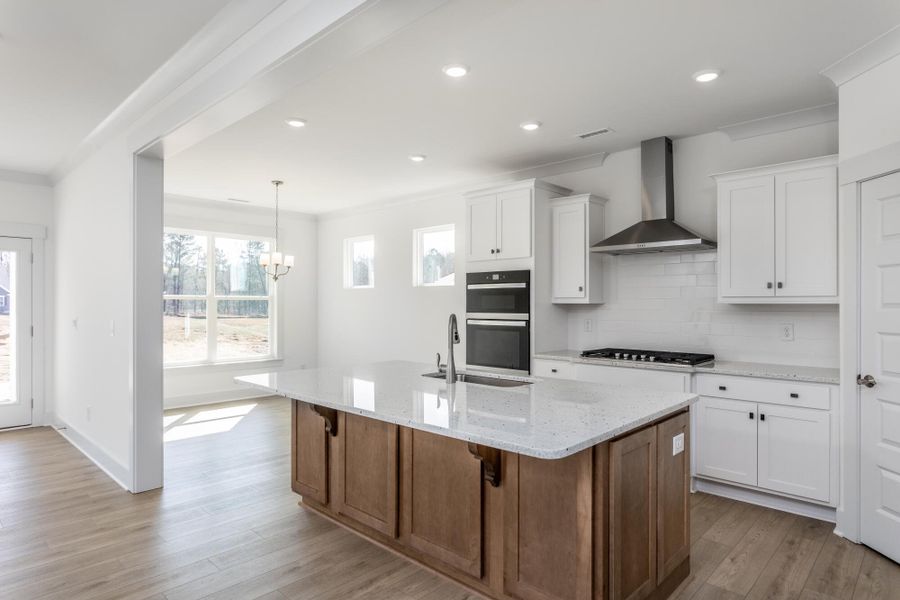 Furnished interior view inside a new home in The Enclave at Hidden Lake - 55+ Community, Youngsville (Image 8).