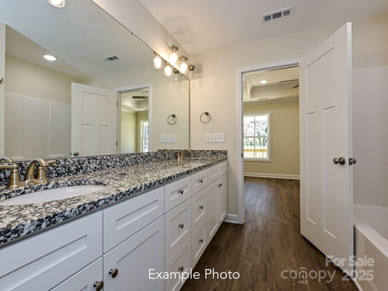 Example Photo Example Photo