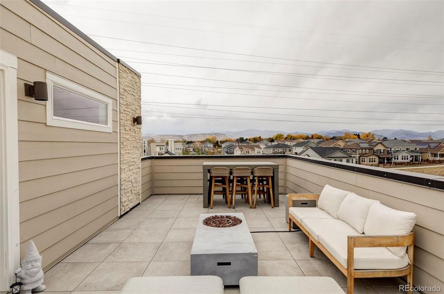Exterior details and patio area of a home in , Arvada (Image 25).