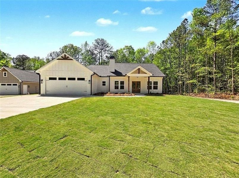 Front exterior of a new home in , Dallas, GA, highlighting curb appeal (Image 1). Front exterior of a new home in , Dallas, GA, highlighting curb appeal (Image 1).