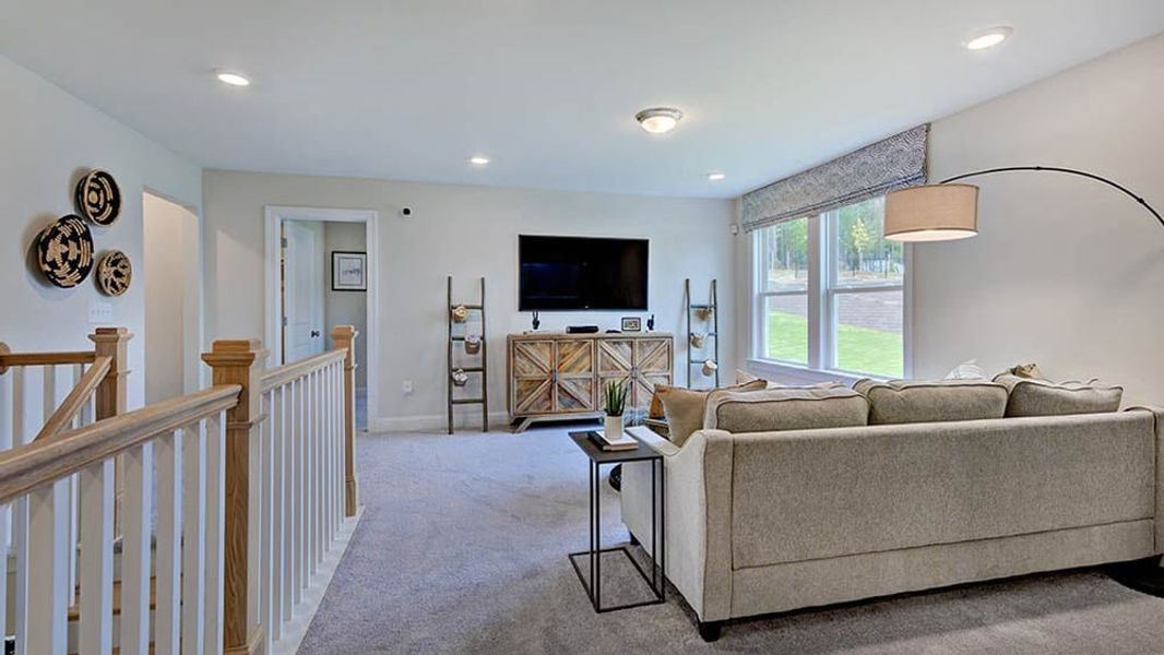 Furnished interior view inside a new home in Bridgeberry, Holly Springs (Image 17).