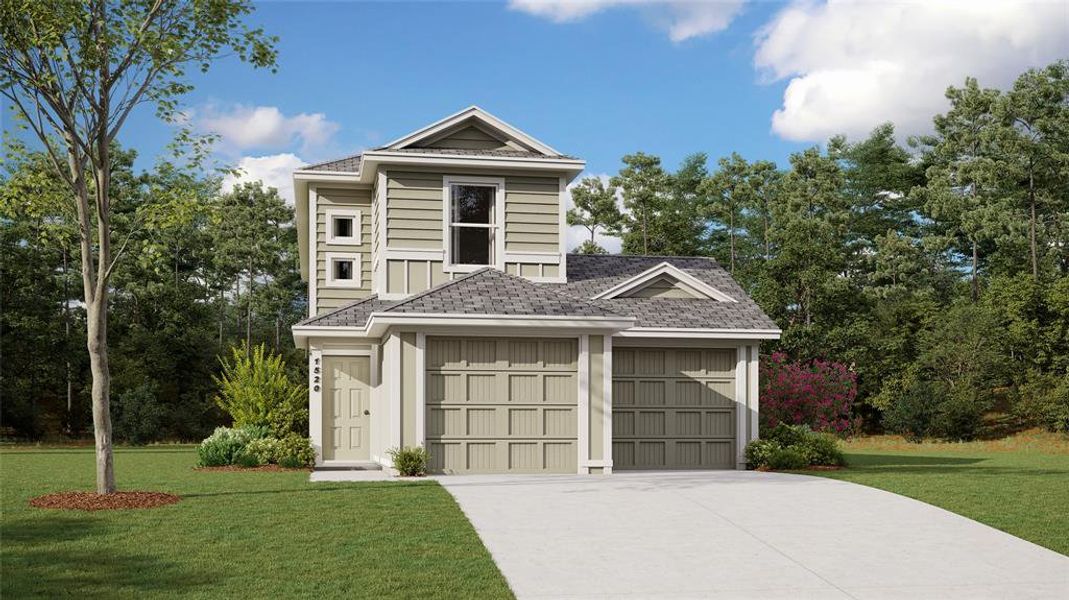 View of front of property featuring a front lawn and a garage