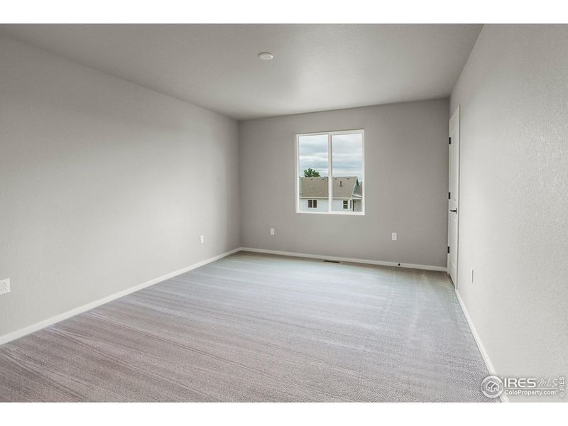 Spacious, unfurnished interior of a new home in Granary Trailblazer Collection - Single Family Homes, Johnstown (Image 29).