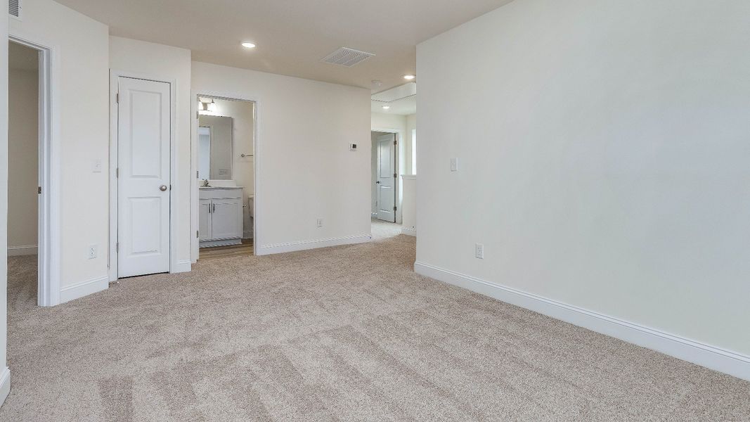 Furnished interior view inside a new home in Sidney Creek Single Family, Zebulon (Image 10).