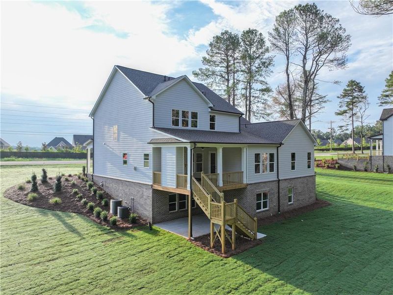 Front exterior of a new home in , Cumming, GA, highlighting curb appeal (Image 37).