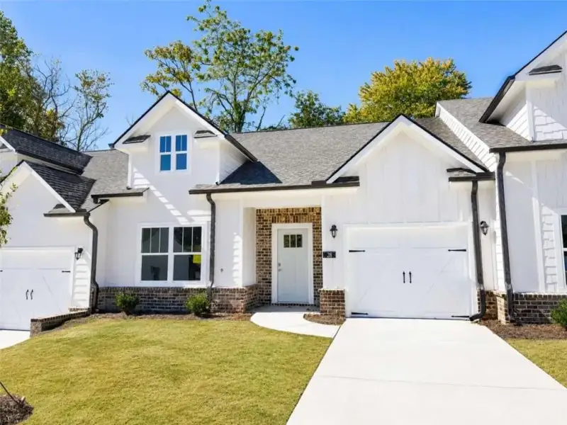 Front exterior of a new home in , Cleveland, GA, highlighting curb appeal (Image 1). Front exterior of a new home in , Cleveland, GA, highlighting curb appeal (Image 1).