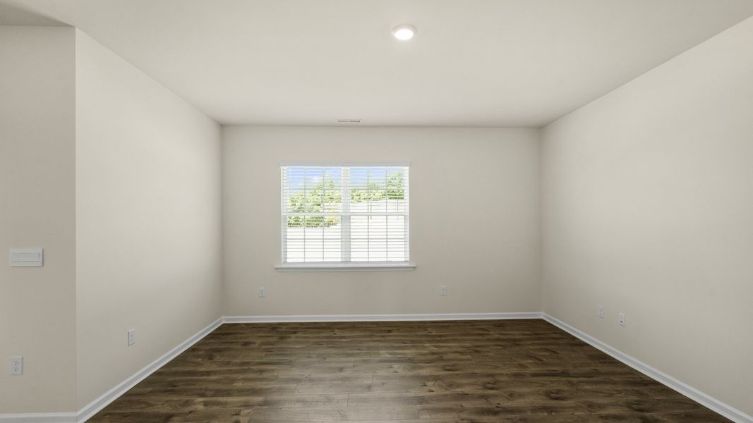Spacious, unfurnished interior of a new home in The Grove at Matthews Landing, Fuquay Varina (Image 11).