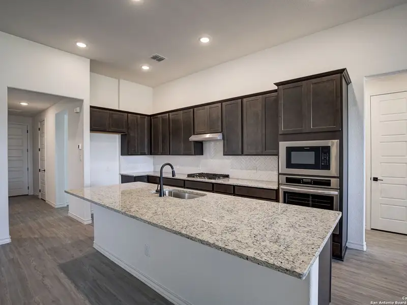 Furnished interior view inside a new home in The Reserve at Potranco Oaks, Castroville (Image 7).