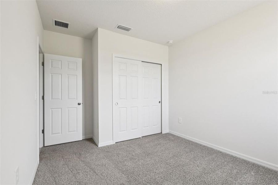 Spacious, unfurnished interior of a new home in Bradbury Creek - Signature Series, Haines City (Image 21).