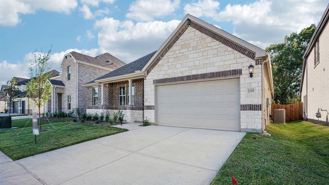 Front exterior of a new home in Windmore, Princeton, TX, highlighting curb appeal (Image 1). Front exterior of a new home in Windmore, Princeton, TX, highlighting curb appeal (Image 1).