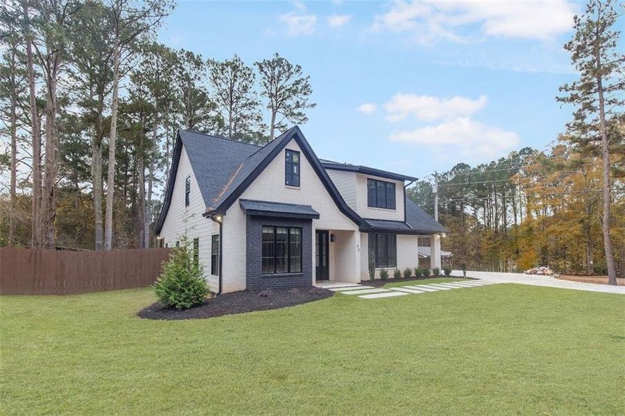 Front exterior of a new home in , Bremen, GA, highlighting curb appeal (Image 20). Front exterior of a new home in , Bremen, GA, highlighting curb appeal (Image 20).