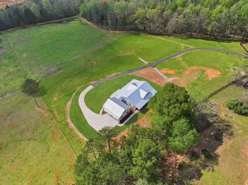 Front exterior of a new home in , Senoia, GA, highlighting curb appeal (Image 35).