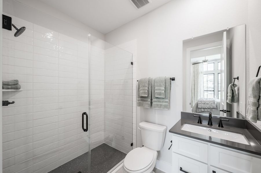 Representative furnished interior of a home built from the Carignan by Tri Pointe Homes in Woodson’s Reserve, Spring (Image 63).