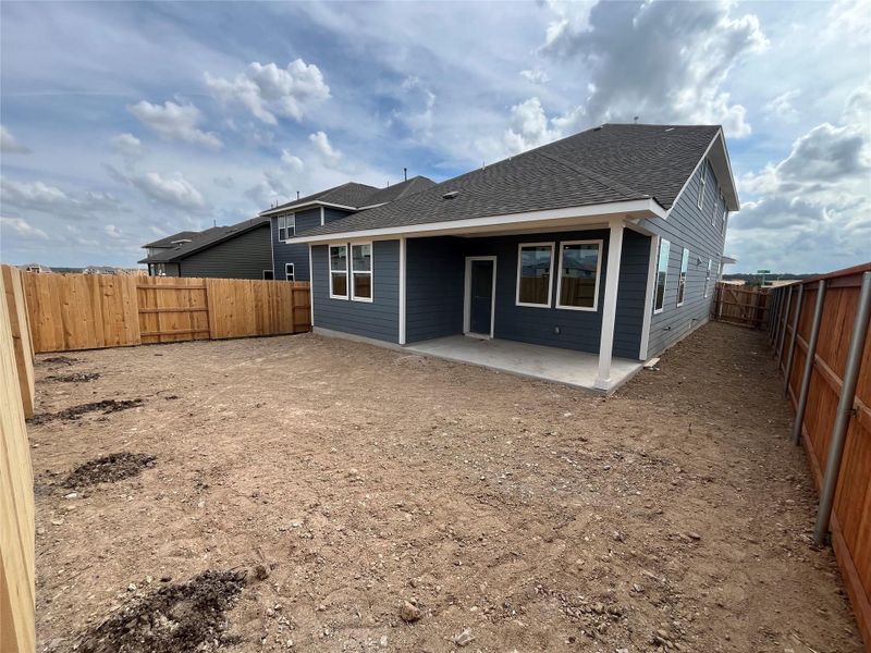 Exterior details and patio area of a home in The Homestead at Lariat, Liberty Hill (Image 11).