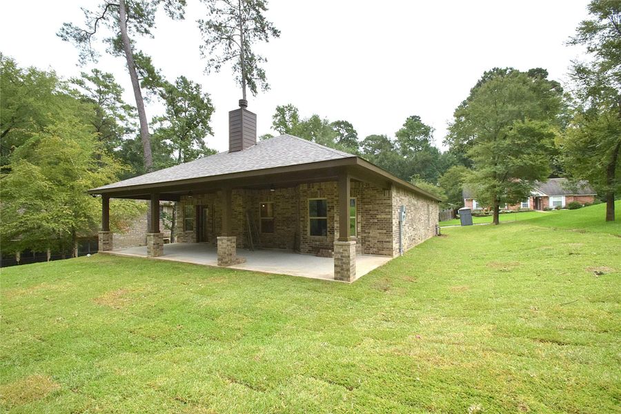 Front exterior of a new home in , Huntsville, TX, highlighting curb appeal (Image 15). Front exterior of a new home in , Huntsville, TX, highlighting curb appeal (Image 15).