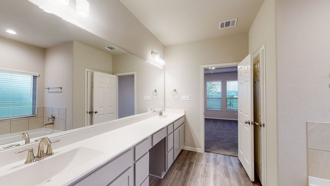 Representative furnished interior of a home built from the Floor Plan 2175 by Colina Homes in Grand Magnolia, Magnolia (Image 8).