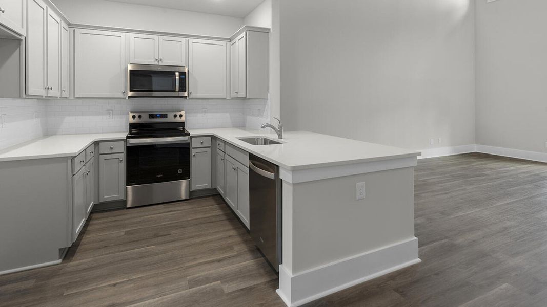 Furnished interior view inside a new home in The Palms at Indigo Preserve Townhomes, Leland (Image 7). Furnished interior view inside a new home in The Palms at Indigo Preserve Townhomes, Leland (Image 7).
