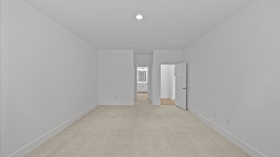 Accomplished design meets restful elegance in this exclusive primary suite by DRB Homes