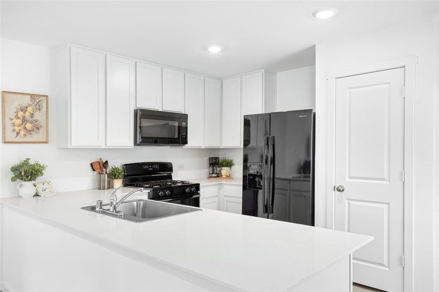 Furnished interior view inside a new home in Mobberly Farms, Pilot Point (Image 4).