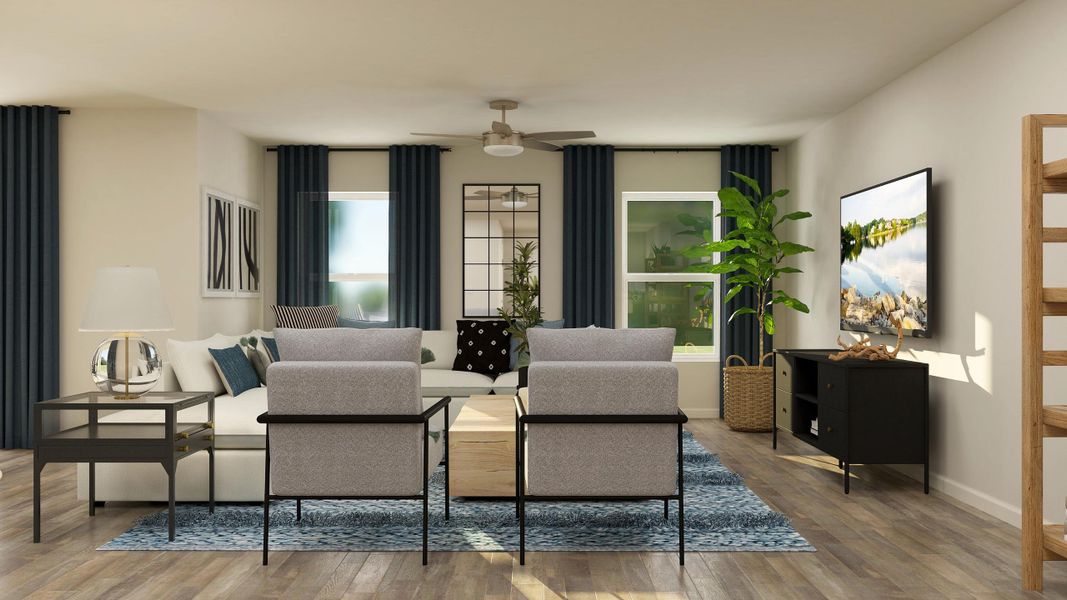 A living room with a large window. A living room with a large window.