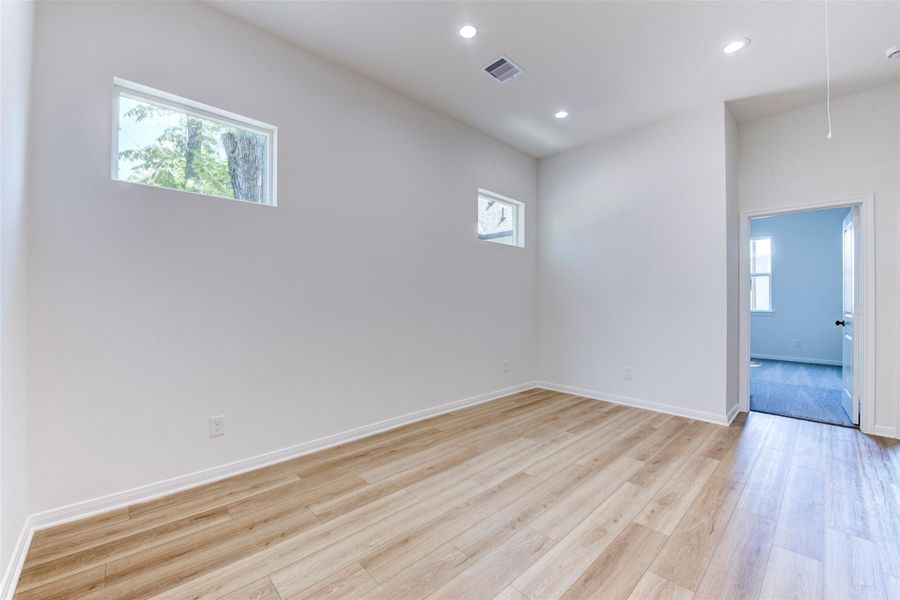Spacious second-floor flex room designed to adapt to your lifestyle, whether used as a home office, playroom, or additional living area.