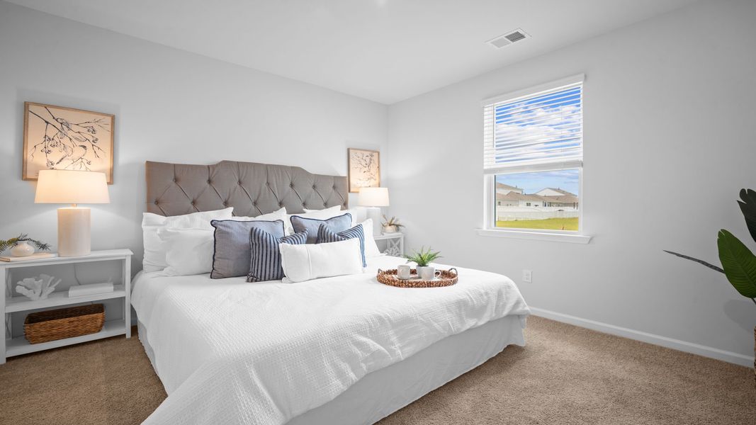 Furnished interior view inside a new home in The Lakes at North Glynn, Brunswick (Image 11).