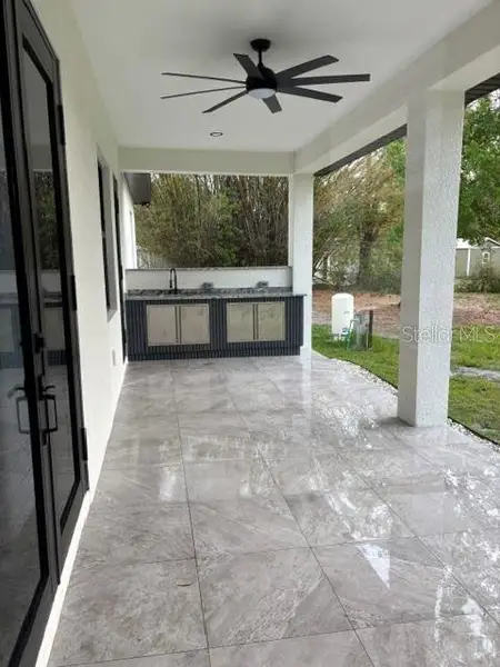 Exterior details and patio area of a home in , Wesley Chapel (Image 4).