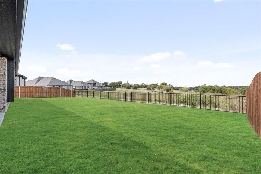 Exterior details and patio area of a home in Devonshire Classic 60-65, Forney (Image 3).