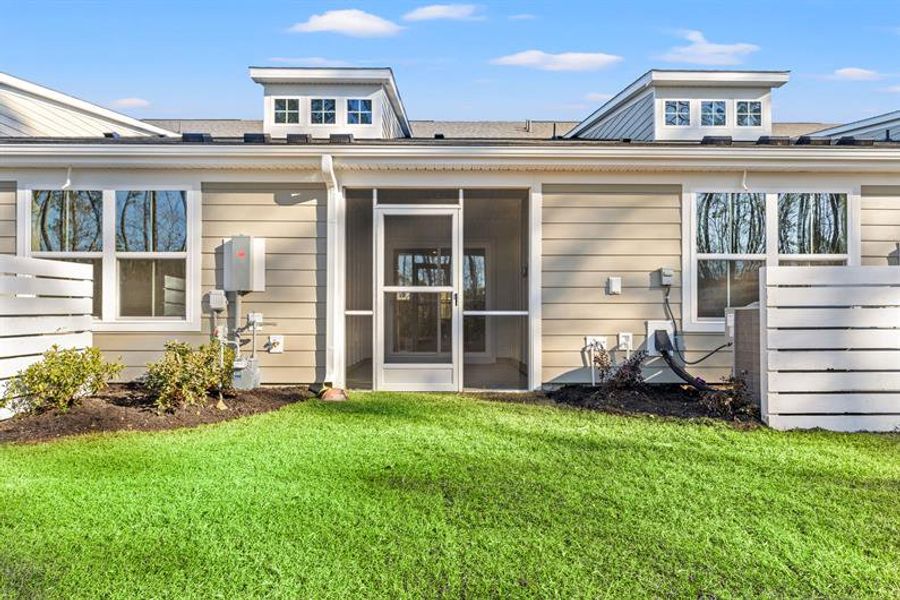 Exterior details and patio area of a home in Course Club at Prince Creek, Murrells Inlet (Image 3).