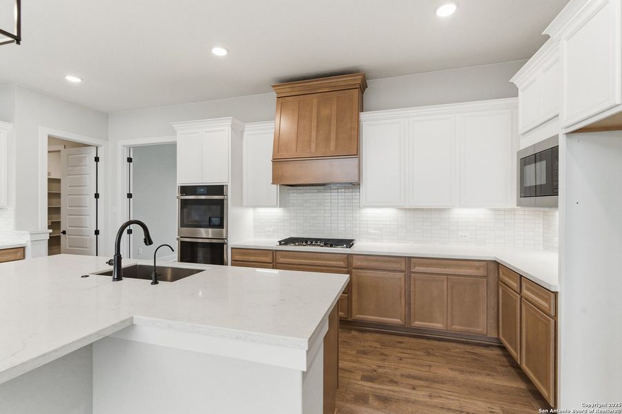 Furnished interior view inside a new home in Potranco Oaks, Castroville (Image 18).