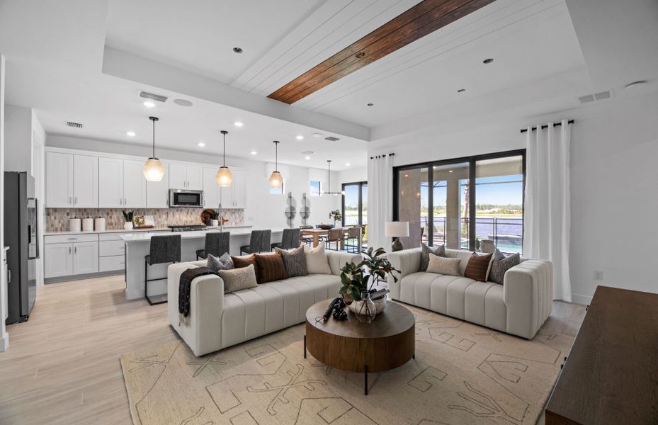 Spacious gathering room with sliding glass doors to lanai