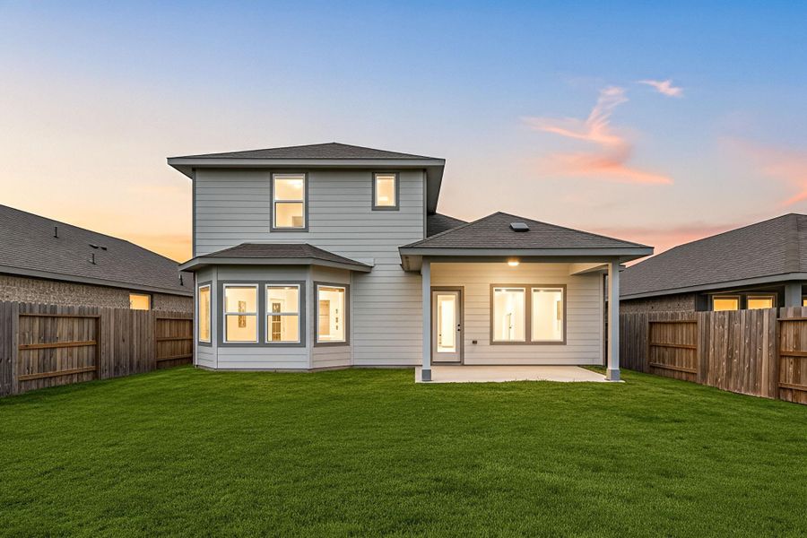 This generous backyard is a perfect oasis for the entire family, with plenty of room for kids to play and adults to unwind. This generous backyard is a perfect oasis for the entire family, with plenty of room for kids to play and adults to unwind.