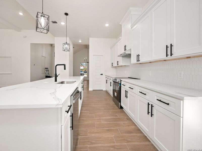 Furnished interior view inside a new home in , Elmendorf (Image 34).