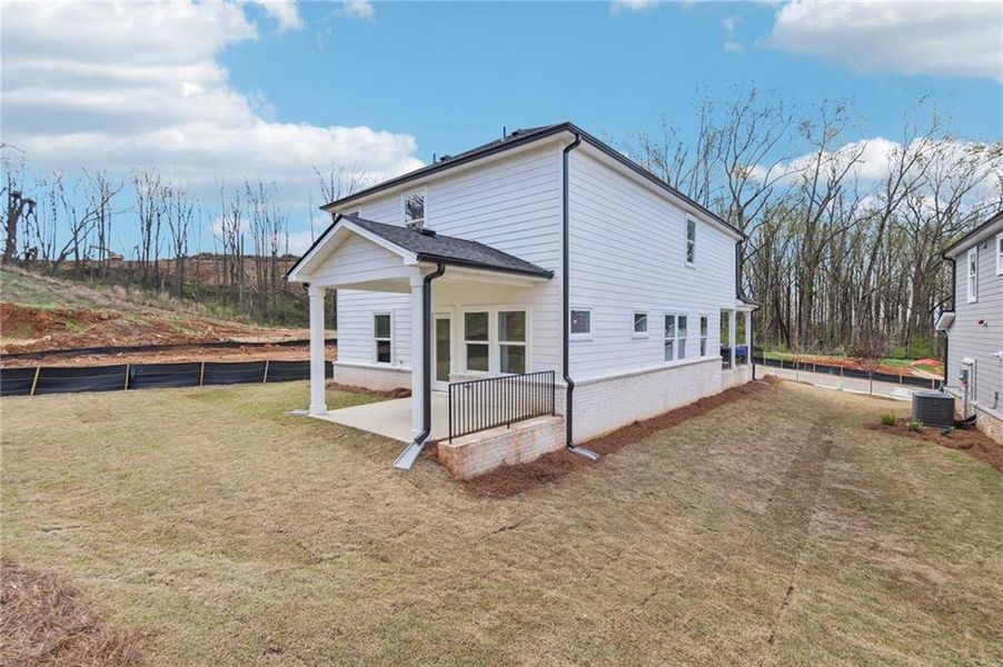 Exterior details and patio area of a home in Hemingway - Reserve Series, Cumming (Image 35).
