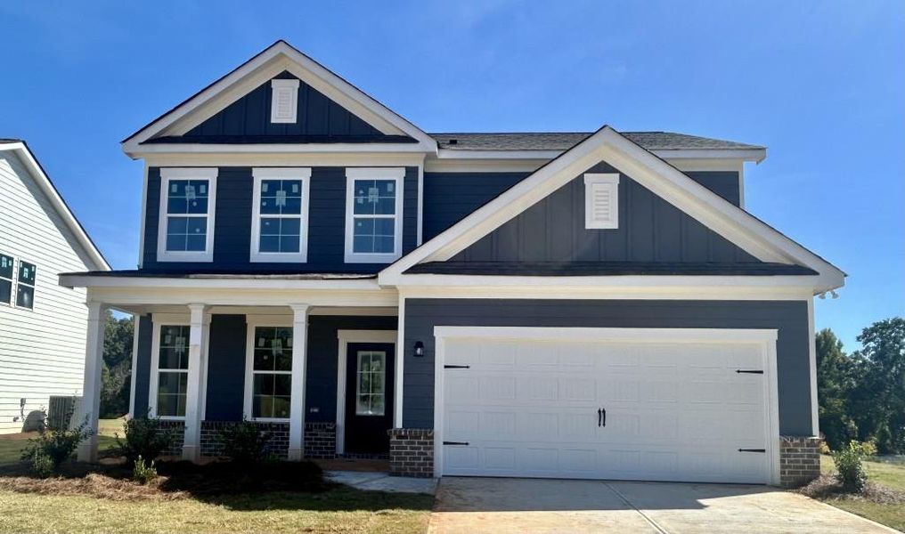 Front exterior of a new home in Red Bird Manor, Jefferson, GA, highlighting curb appeal (Image 1). Front exterior of a new home in Red Bird Manor, Jefferson, GA, highlighting curb appeal (Image 1).