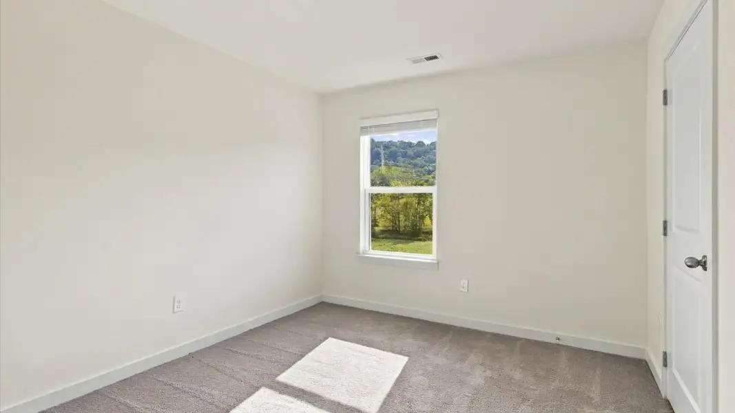 Representative unfurnished interior of a home built from the Glendale by D.R. Horton in Belhaven, Knoxville (Image 34).