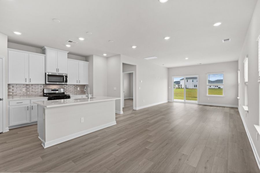Furnished interior view inside a new home in Cypress Ridge - The Boardwalk Series, Longs (Image 8).