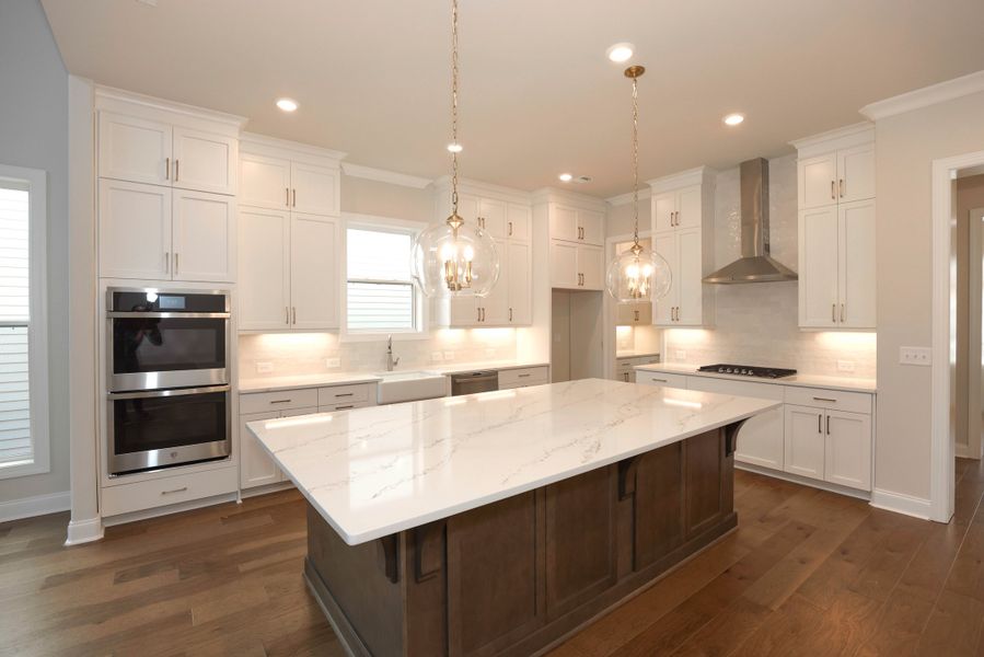 Representative furnished interior of a home built from the The Maddox by The Providence Group in Bellmoore Park, Johns Creek (Image 9).