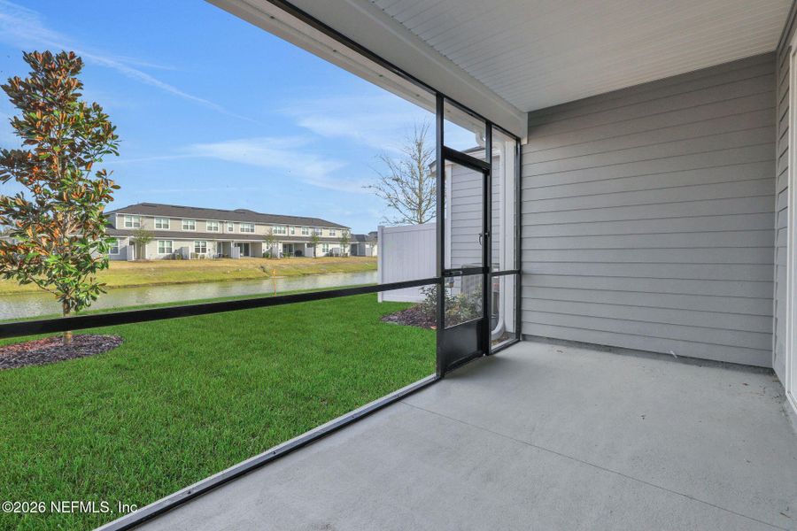 Exterior details and patio area of a home in Cherry Elm at SilverLeaf, St. Augustine (Image 29).
