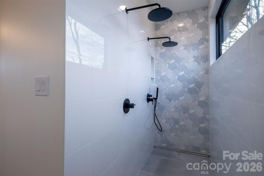 Large shower with dual shower heads