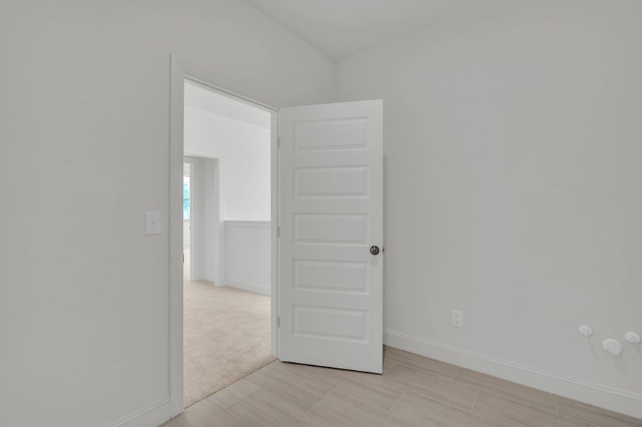 Representative unfurnished interior of a home built from the The Hampton by RobuckHomes in Windwater, Hampstead (Image 53).