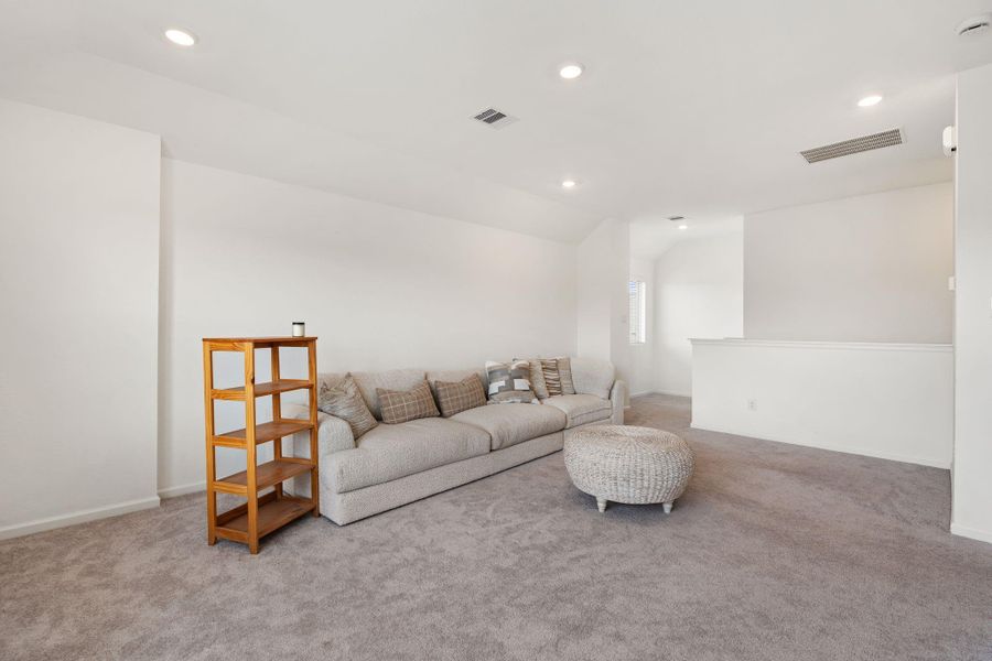 Furnished interior view inside a new home in Sunterra, Katy (Image 18).